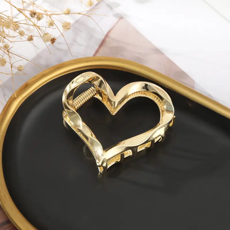Pinza para el pelo de metal con forma de corazón